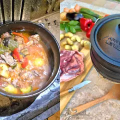 Un chaudron mijote sur un feu de bois, ses ingrédients savoureux promettant une délicieuse recette. À côté, les légumes frais et la viande attendent leur tour.